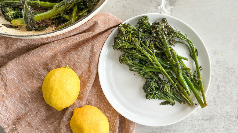  broccolini on plate with lemon