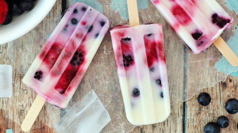 homemade popsicles with raspberries and blueberries